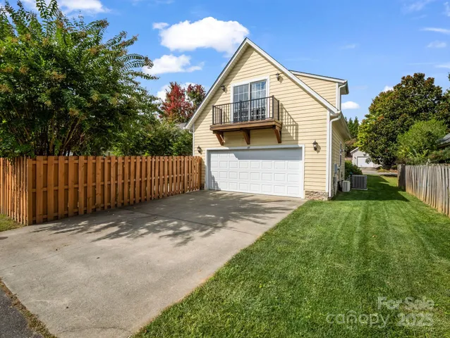 a view of a back yard of the house