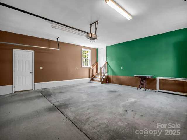 a view of a livingroom with a furniture and a ceiling fan