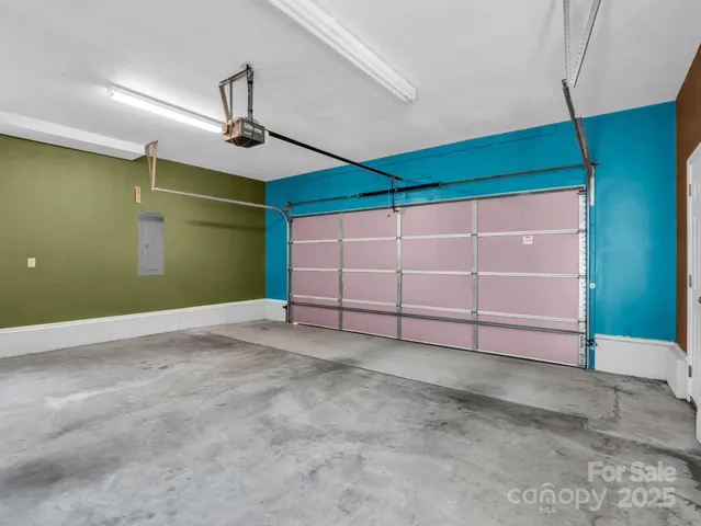 a view of a room with window and fan