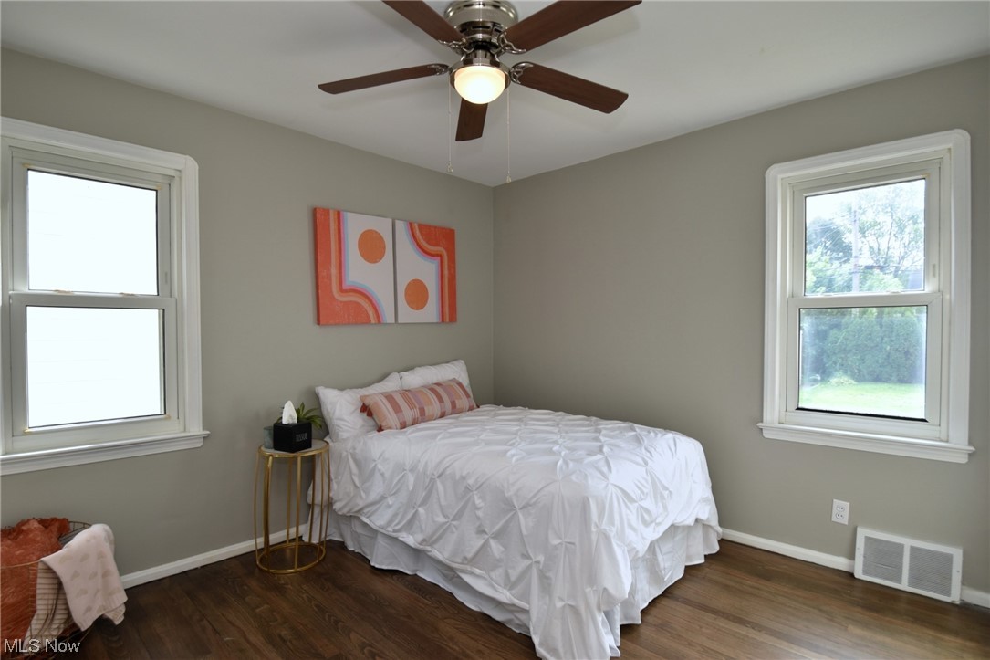 13300 Rockside Road Garfield Heights, OH 44125 - Photo 18 of 32 Hardwood floored bedroom with ceiling fan