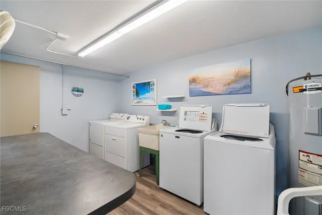 a view of a storage & utility room with washer and dryer