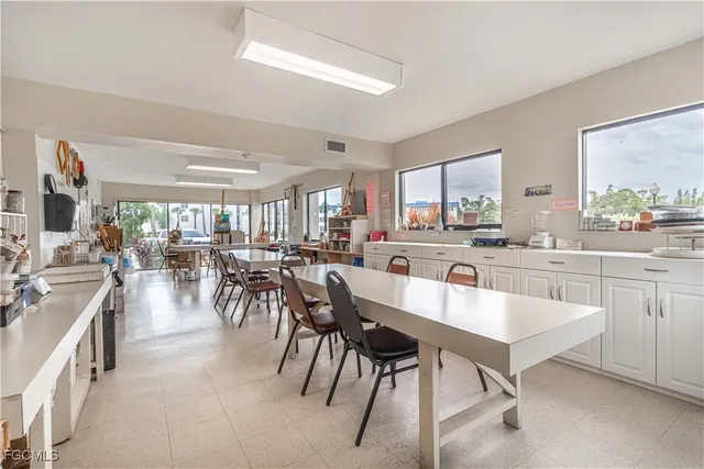 a view of a workspace with furniture