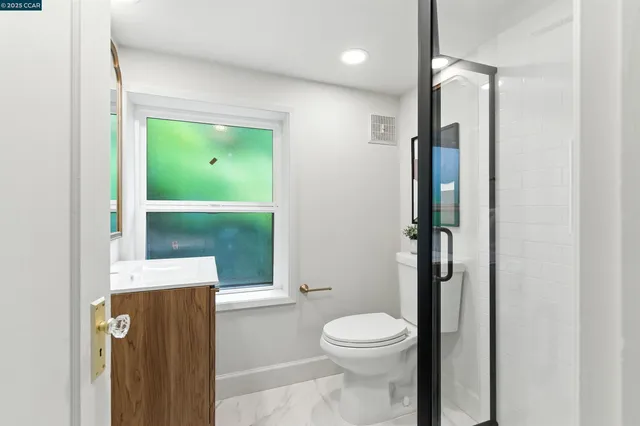 a view of house with a deck and furniture