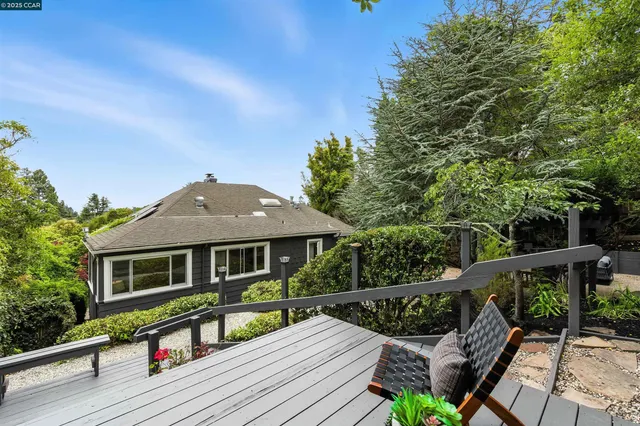 a view of wooden deck with a table and chairs
