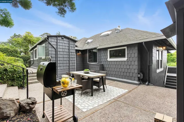 a outdoor living space with furniture and garden view