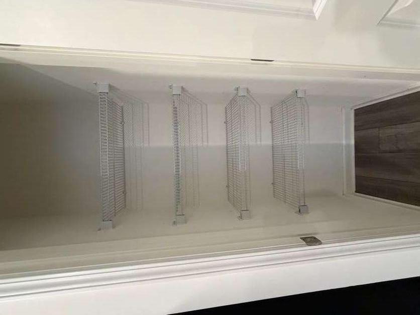 35300 Condor Court Atlanta, GA 30331 - Photo 11 of 31 a view of walk in closet with empty racks