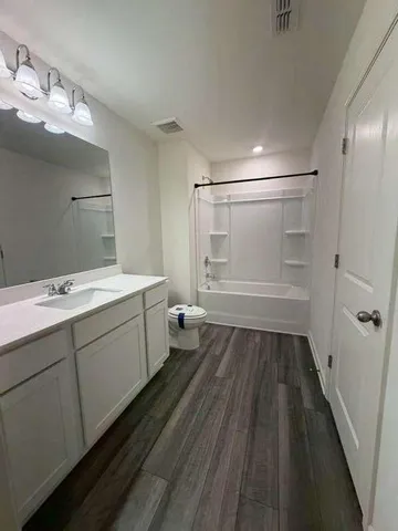 a view of a room with racks on the wall