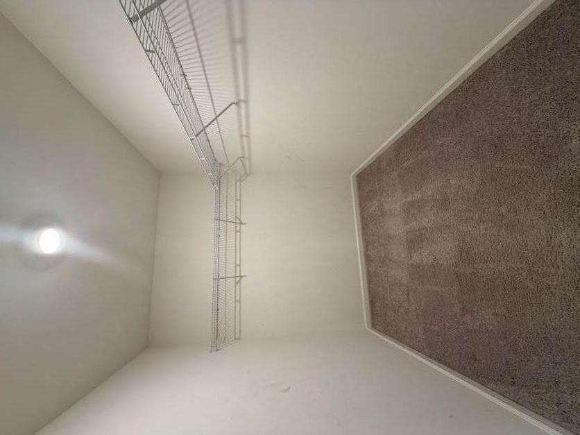 35300 Condor Court Atlanta, GA 30331 - Photo 19 of 31 a view of a room with racks on the wall