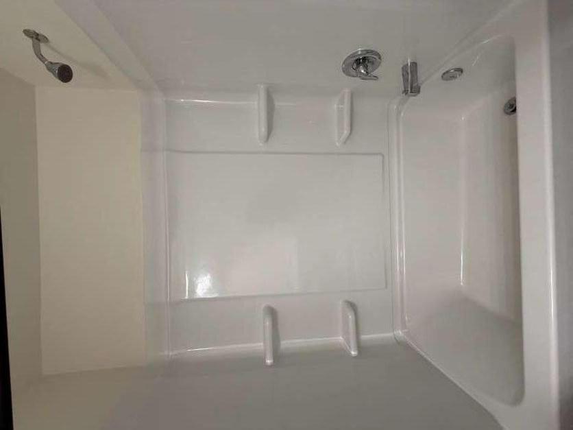 35300 Condor Court Atlanta, GA 30331 - Photo 23 of 31 a bathroom with a bathtub