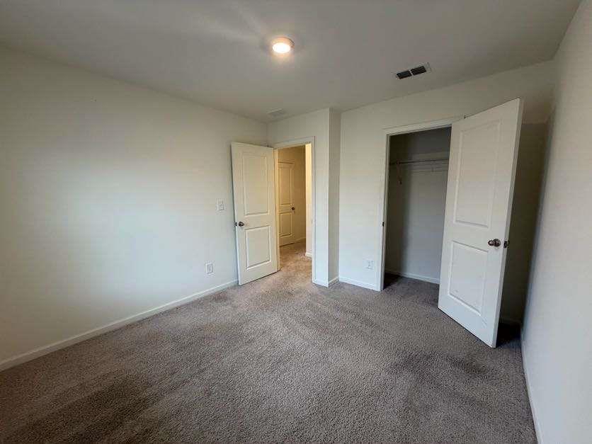 35300 Condor Court Atlanta, GA 30331 - Photo 27 of 31 an empty room with closet area