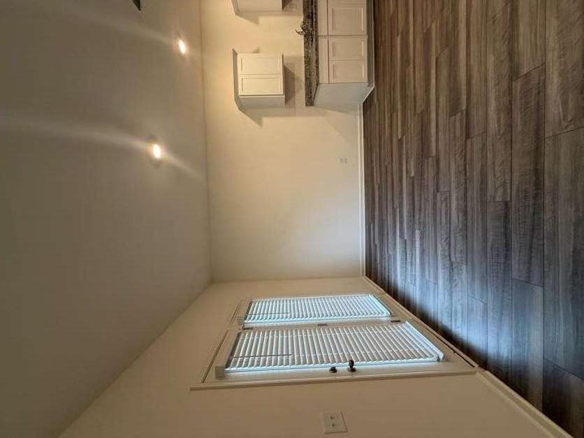 35300 Condor Court Atlanta, GA 30331 - Photo 5 of 31 a view of an empty room with wooden floor and a window