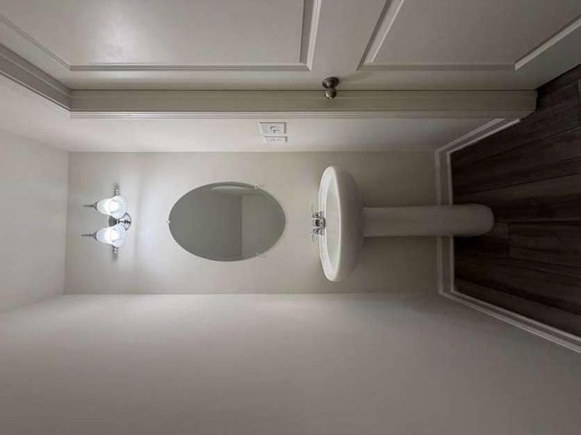 35300 Condor Court Atlanta, GA 30331 - Photo 7 of 31 a bathroom with a sink and a mirror