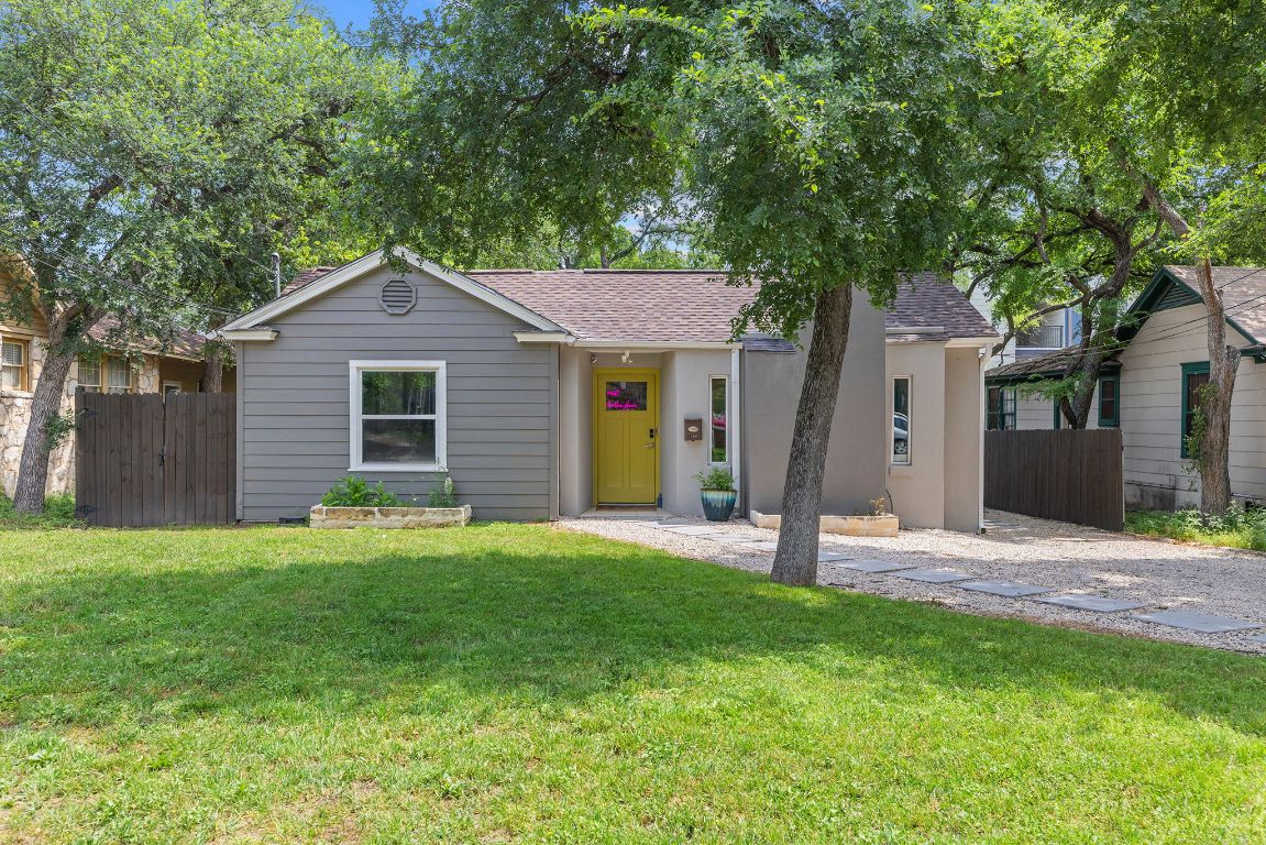 3909 Willbert Road, Unit A Austin, TX 78751 - Photo 1 of 1 a front view of a house with a garden