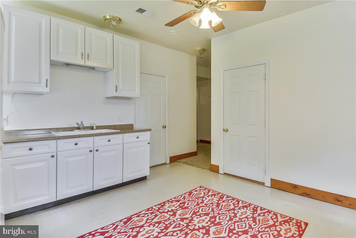 14102 Longnecker Road Reisterstown, MD 21136 - Photo 32 of 36 Lower level kitchen w it's own entrance