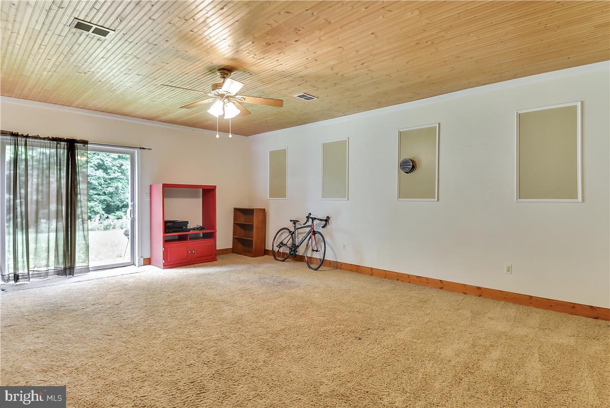 14102 Longnecker Road Reisterstown, MD 21136 - Photo 33 of 36 Lower level rec room with another entrance