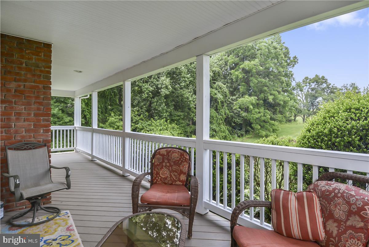 14102 Longnecker Road Reisterstown, MD 21136 - Photo 9 of 36 3 sided porch has room for dining table