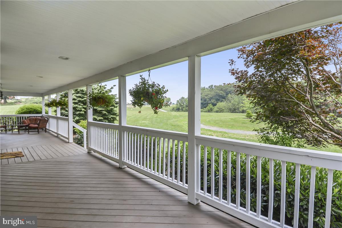 14102 Longnecker Road Reisterstown, MD 21136 - Photo 10 of 36 Hooks are already in place for the porch swing!