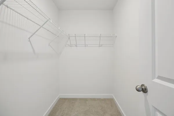 a view of a room with racks on the wall