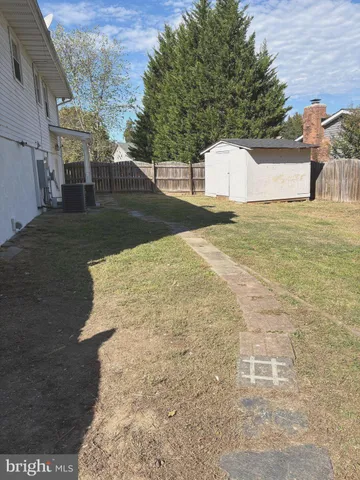 a bathroom with a sink and a large mirror