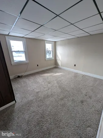 a view of a room next to a window