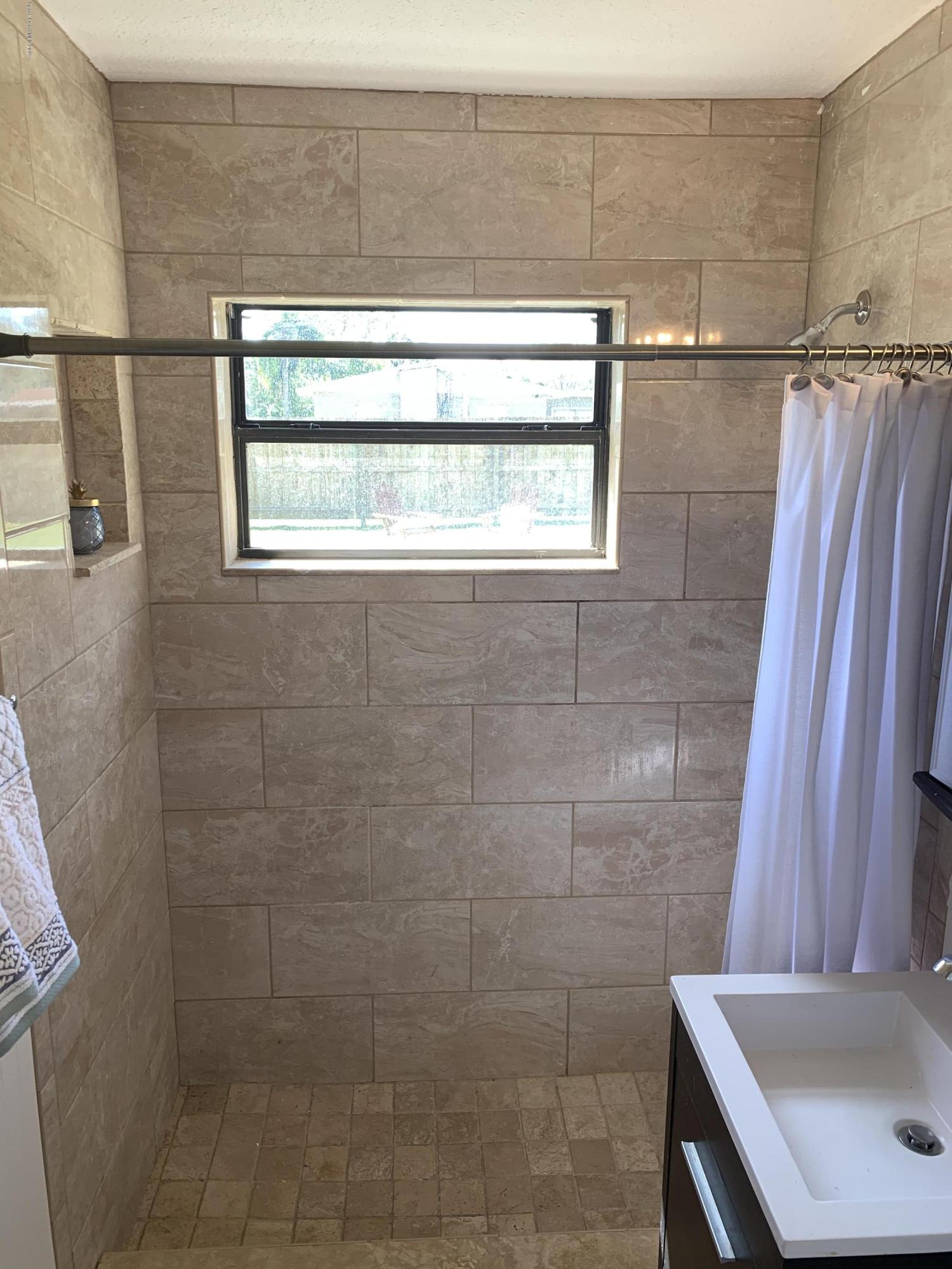 2043 Little John Road Melbourne, FL 32935 - Photo 13 of 30 Hall Bath