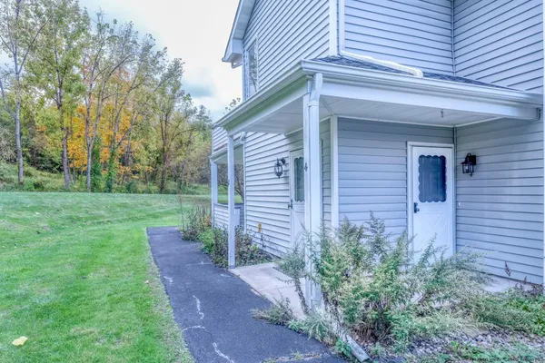 a view of a back yard of the house