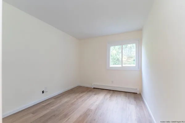 an empty room with a window