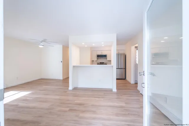 a view of kitchen with wooden floor