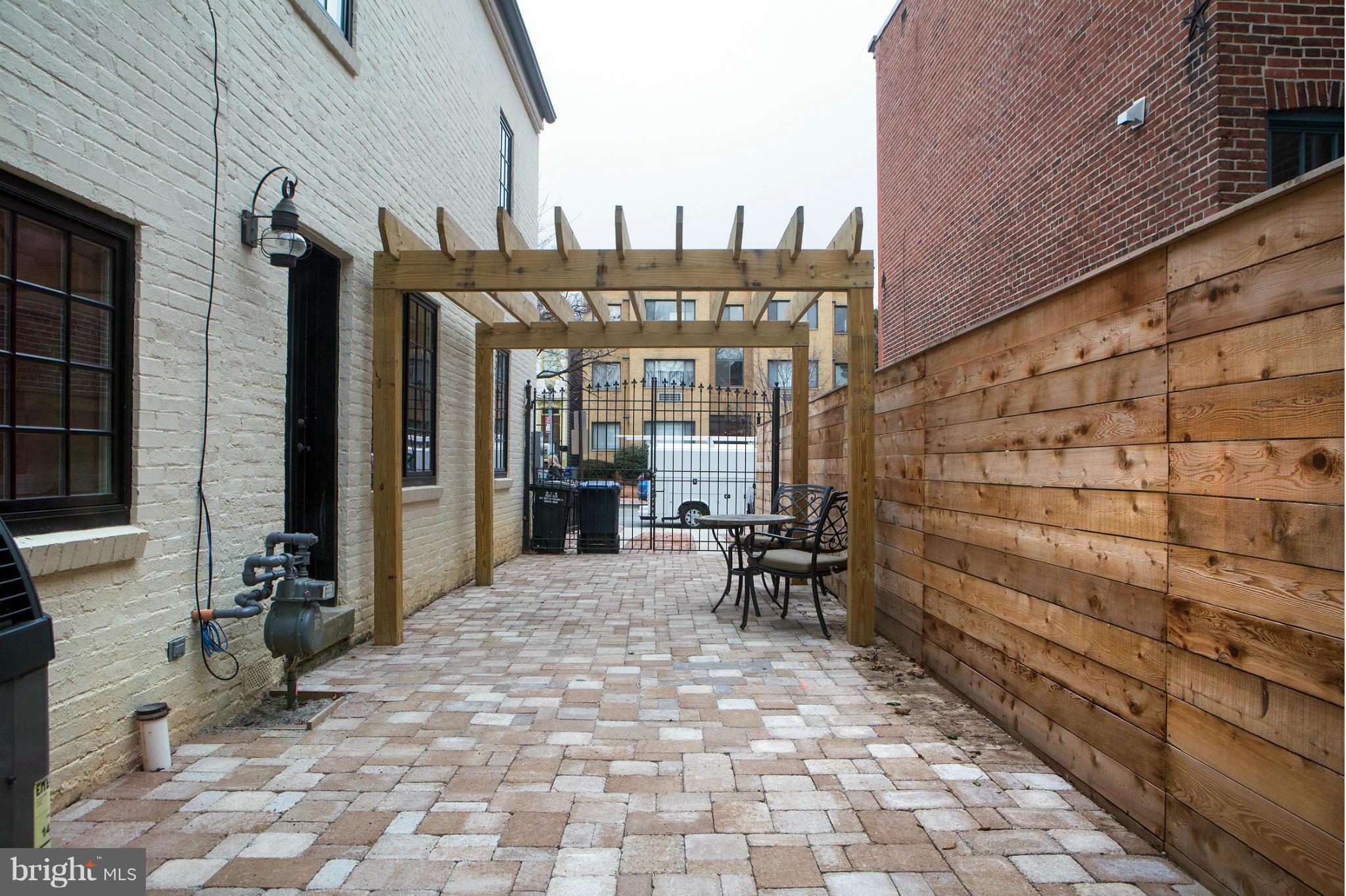 407 Independence Avenue Southeast Washington, DC 20003 - Photo 2 of 30 Side Patio/Driveway