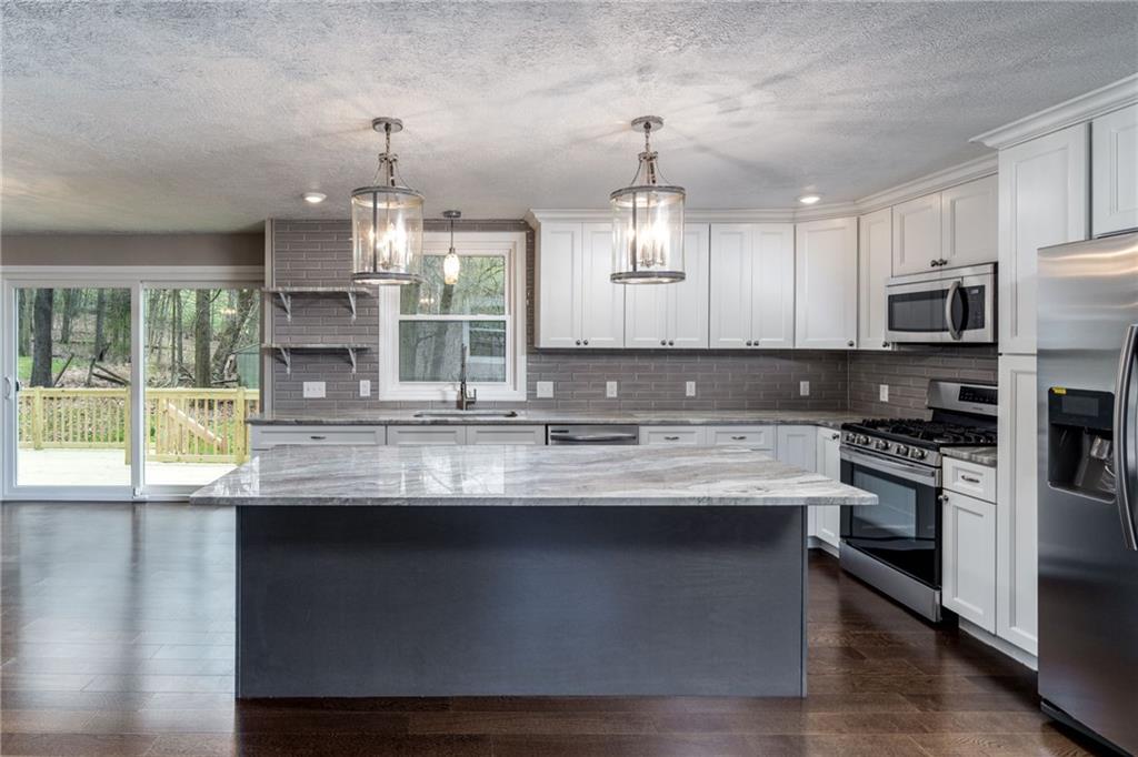 1799 Locust Road Sewickley, PA 15143 - Photo 3 of 25 Eat-in kitchen, large island, pendant lighting.