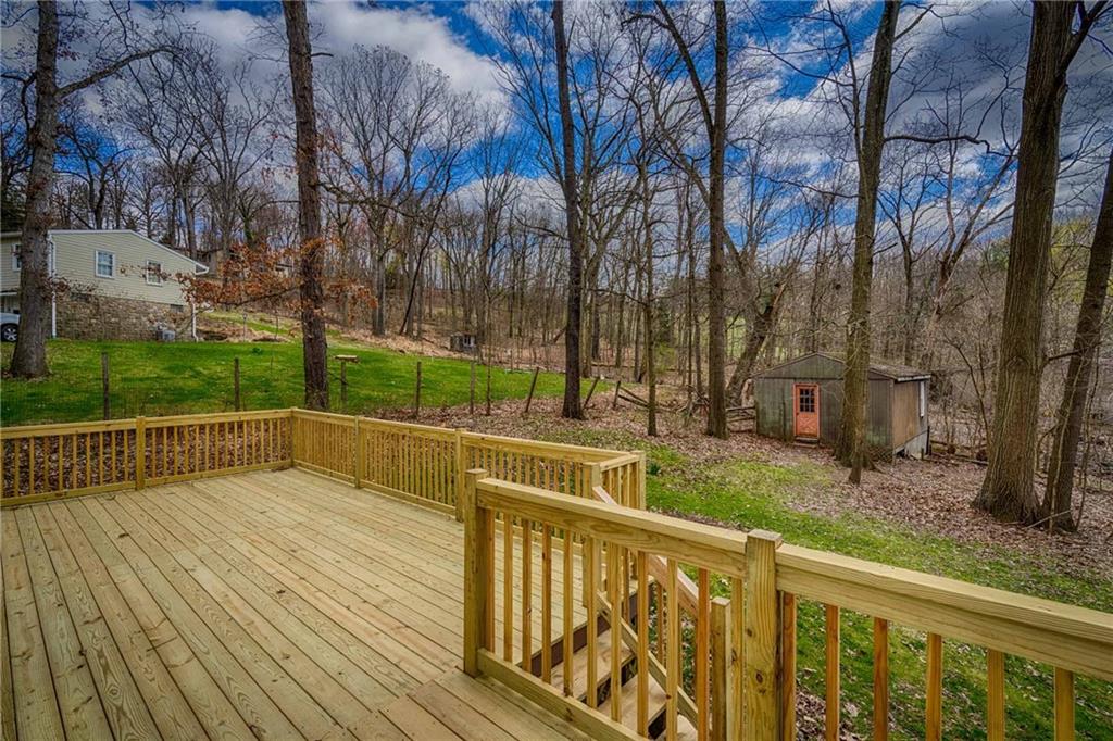 1799 Locust Road Sewickley, PA 15143 - Photo 22 of 25 New back deck overlooks wooded yard.