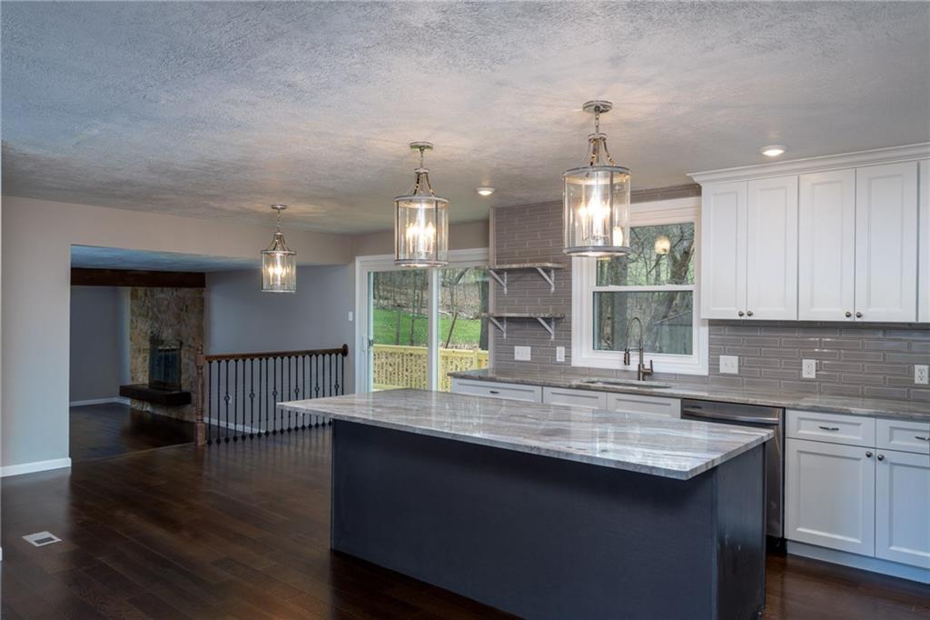 1799 Locust Road Sewickley, PA 15143 - Photo 4 of 25 Kitchen open to family room.