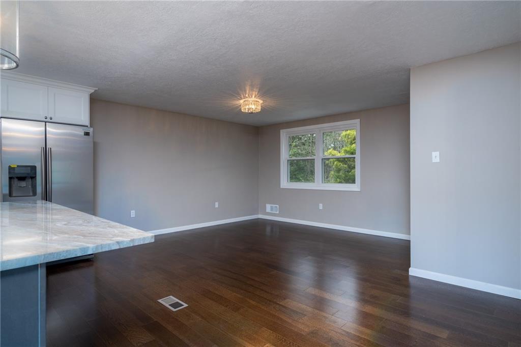 1799 Locust Road Sewickley, PA 15143 - Photo 9 of 25 Den is open to the family room -- ideal for home office, playroom or dining room.