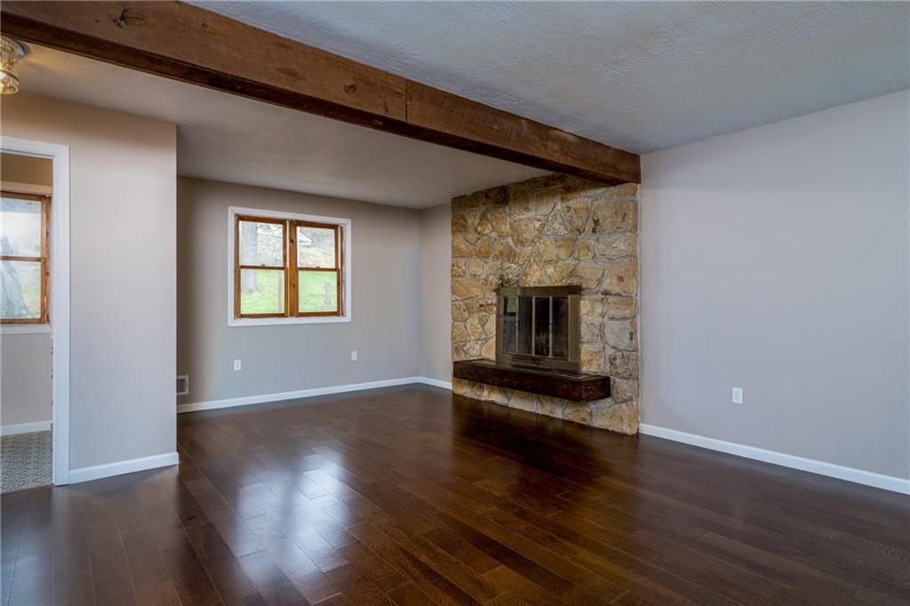 1799 Locust Road Sewickley, PA 15143 - Photo 10 of 25 Large family room with wood burning fireplace.