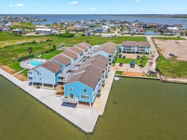 a view of a city with a lake