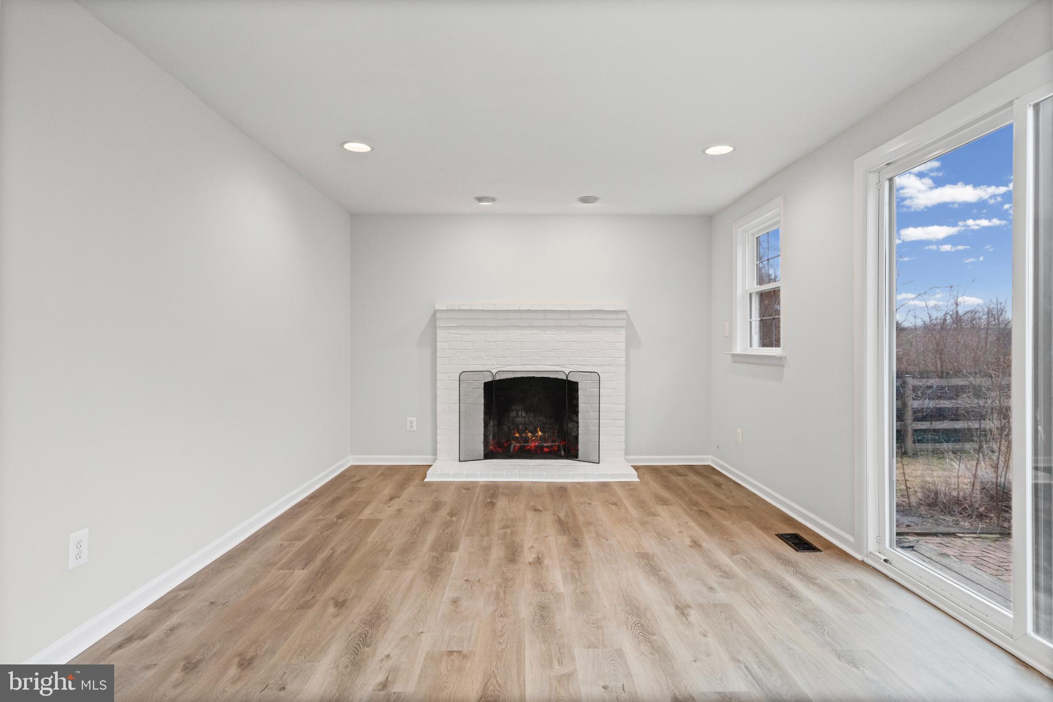 3416 Kreitler Road Forest Hill, MD 21050 - Photo 15 of 45 Bright and airy space with a cozy fireplace.