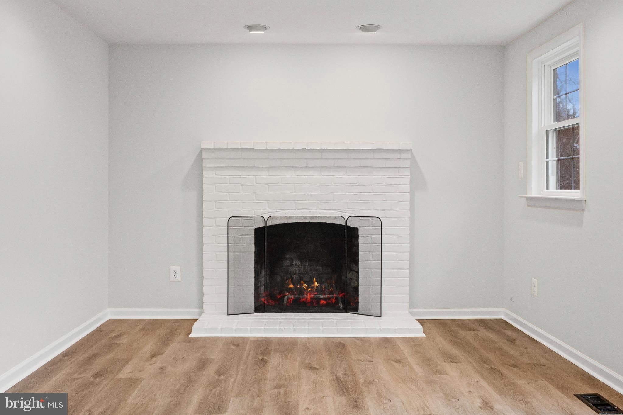 3416 Kreitler Road Forest Hill, MD 21050 - Photo 16 of 45 Cozy fireplace in a bright, airy space.