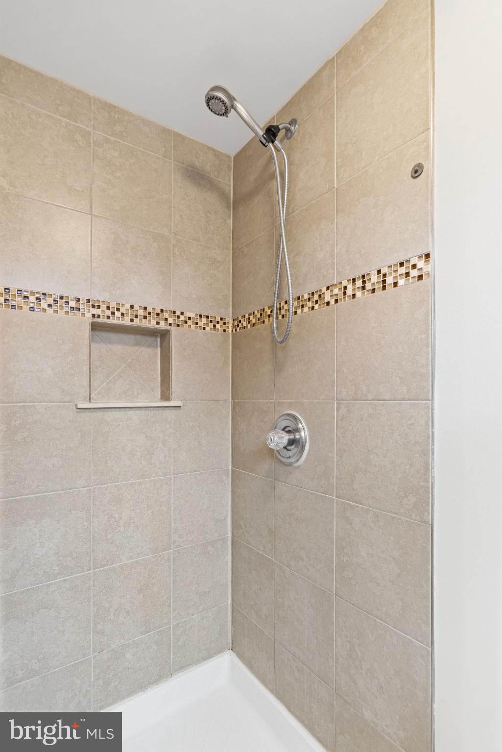 3416 Kreitler Road Forest Hill, MD 21050 - Photo 35 of 45 Sleek shower with modern tile accents.
