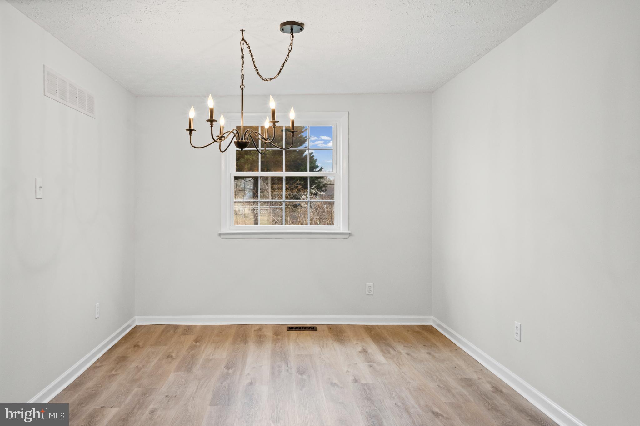 3416 Kreitler Road Forest Hill, MD 21050 - Photo 8 of 45 Bright, airy space with elegant chandelier.