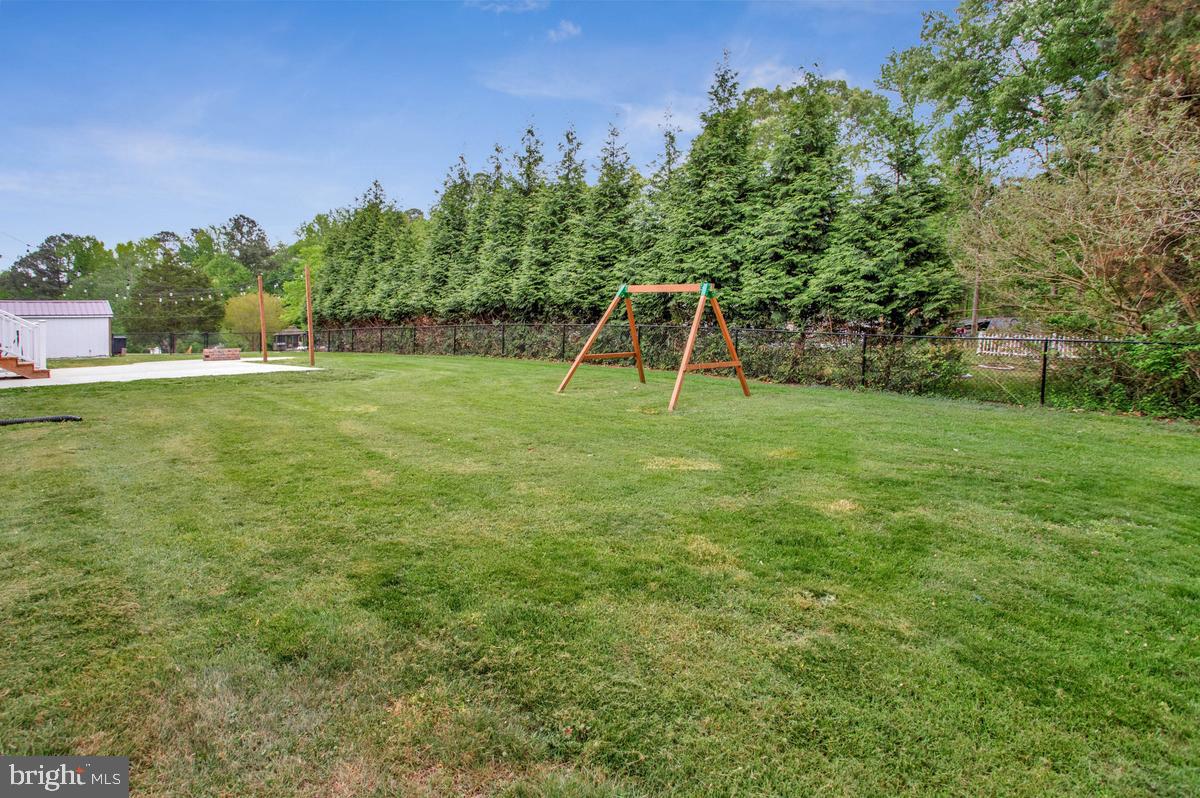 40295 Busy Corner Road Leonardtown, MD 20650 - Photo 8 of 34 Spacious yard with swing set charm.
