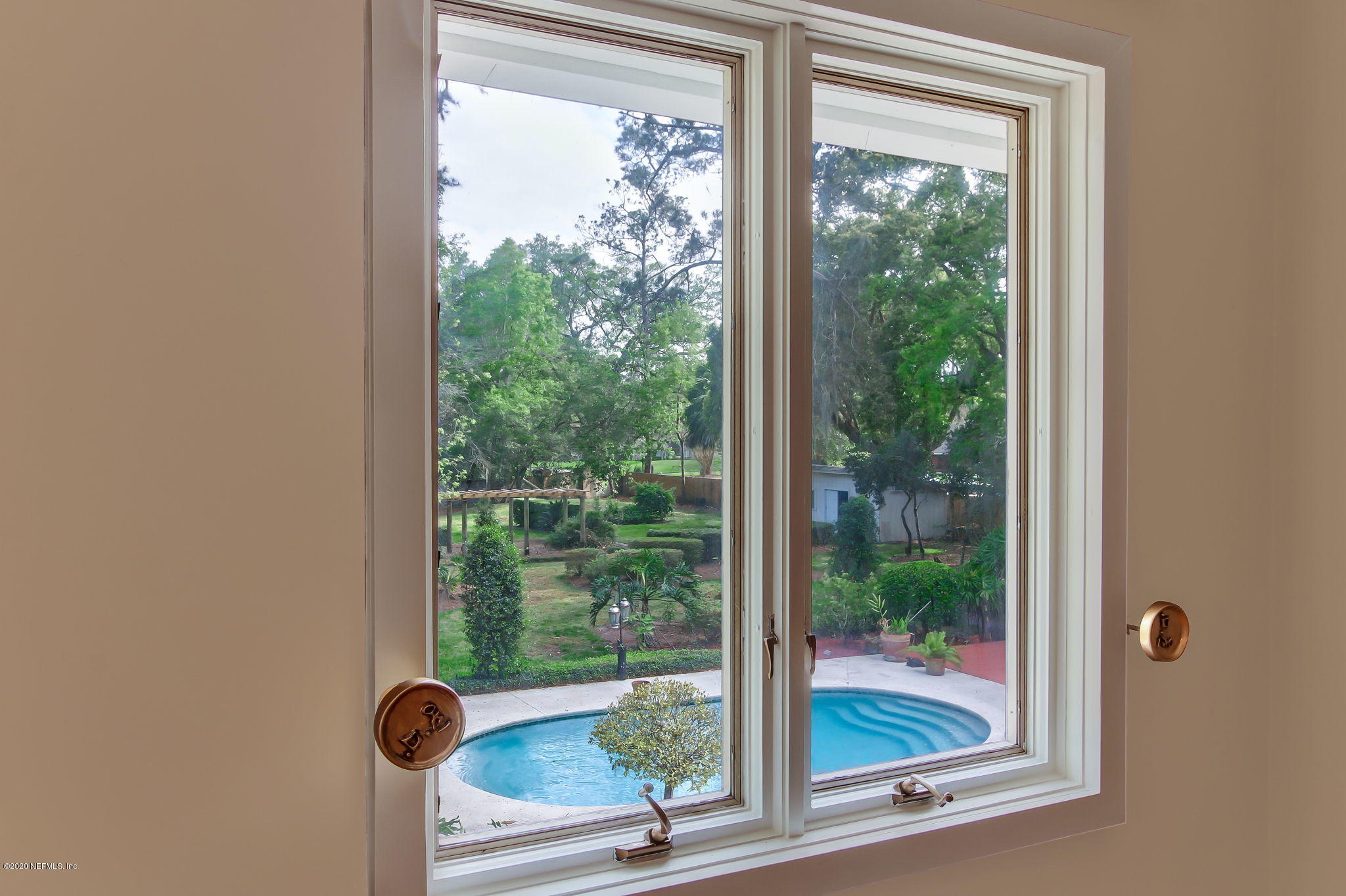 12193 Mandarin Road Jacksonville, FL 32223 - Photo 17 of 45 a view of a window and a porch