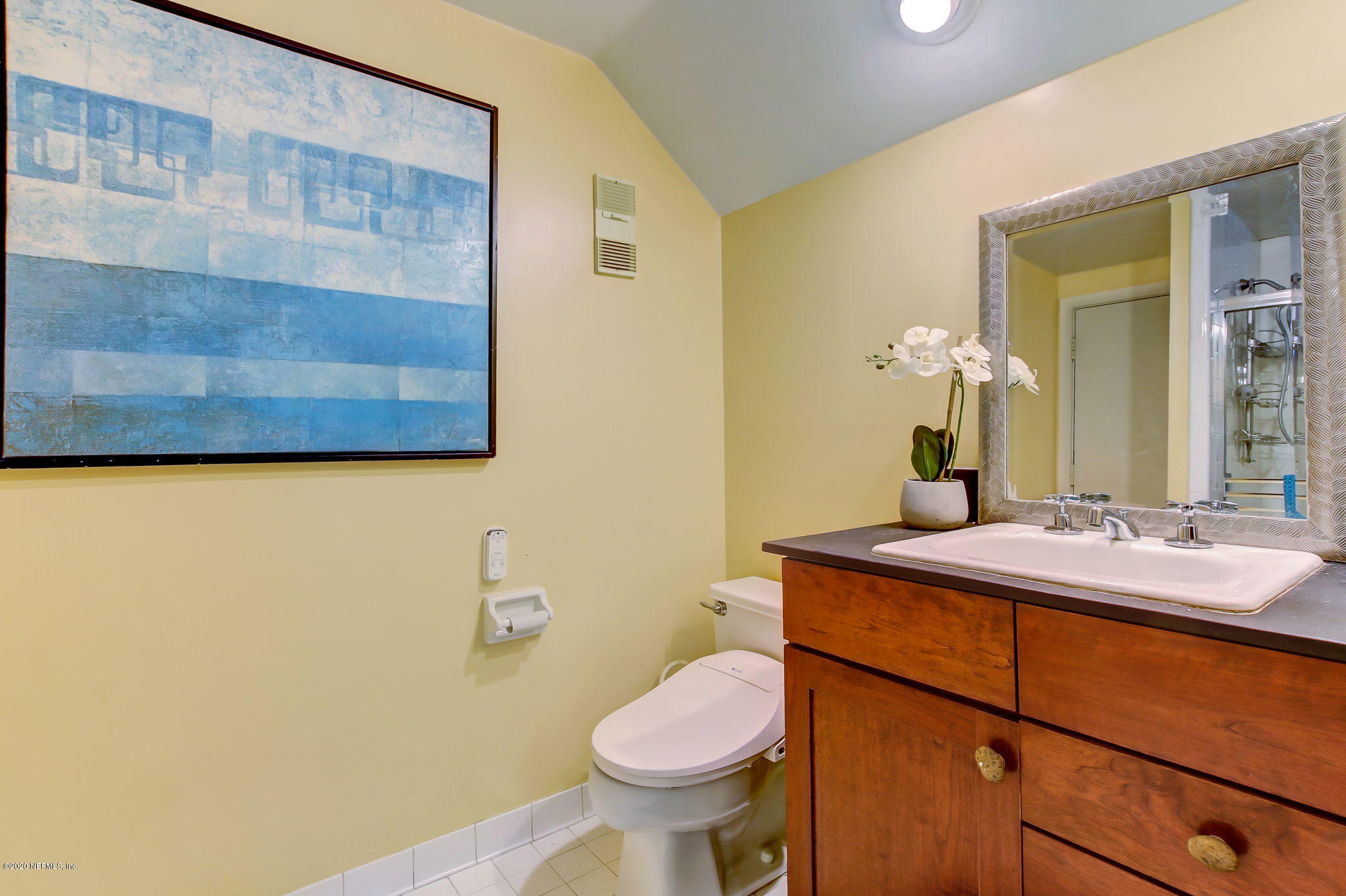 12193 Mandarin Road Jacksonville, FL 32223 - Photo 22 of 45 a bathroom with a granite countertop toilet sink and mirror