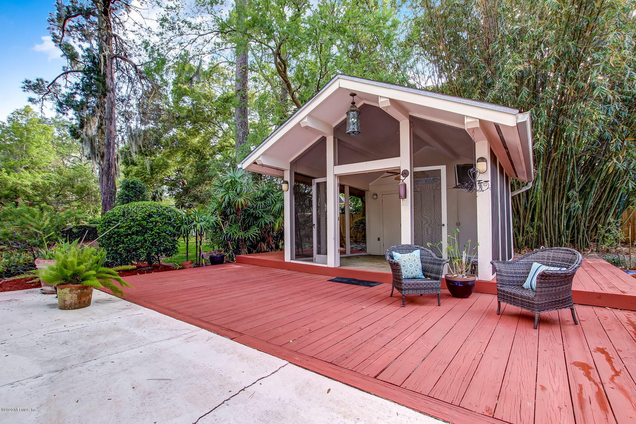 12193 Mandarin Road Jacksonville, FL 32223 - Photo 35 of 45 a view of a house with backyard and sitting area
