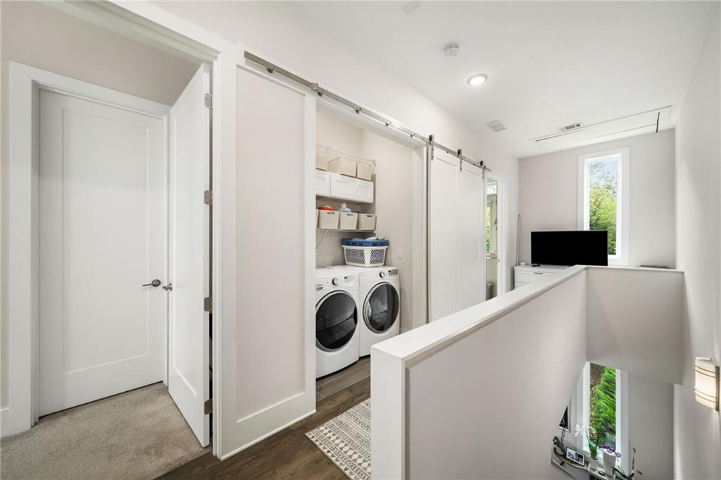 52 Reynolds Square Lane Atlanta, GA 30307 - Photo 19 of 32 a view of a kitchen with a refrigerator and washer