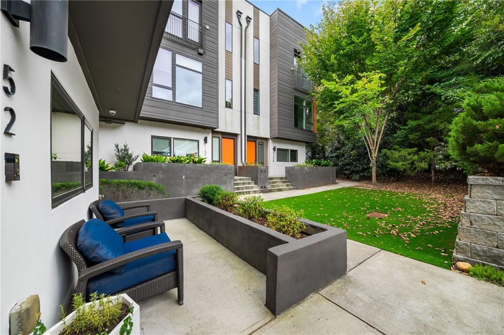 52 Reynolds Square Lane Atlanta, GA 30307 - Photo 5 of 32 a view of an outdoor sitting space