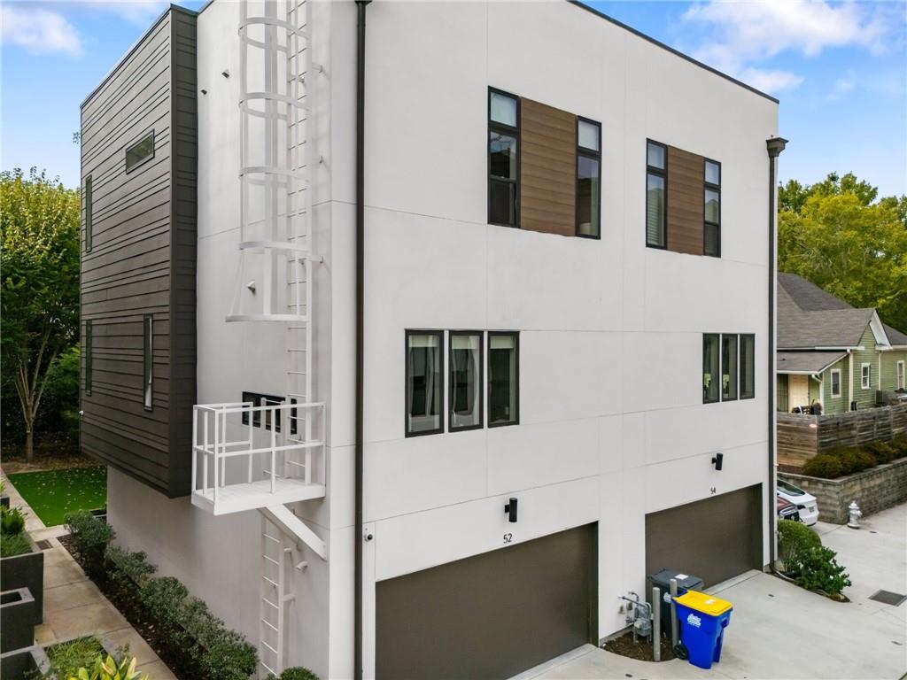 52 Reynolds Square Lane Atlanta, GA 30307 - Photo 7 of 32 a view of building with an outdoor space