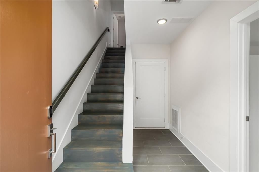 52 Reynolds Square Lane Atlanta, GA 30307 - Photo 9 of 32 a view of an entryway with wooden floor