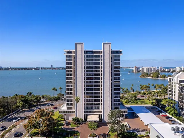 a view of a swimming pool and a back yard
