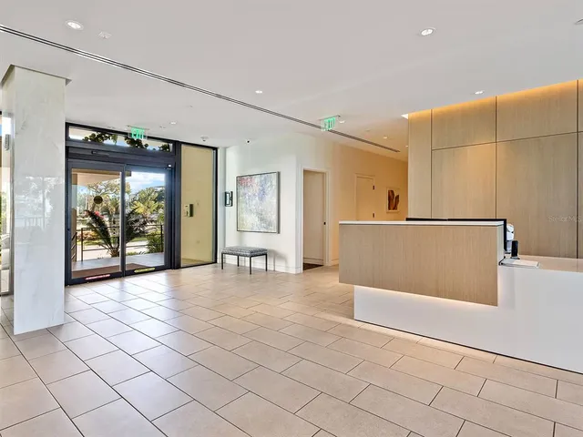a outdoor dining space with furniture and a potted plant