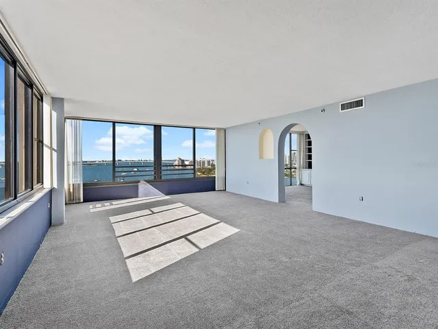 hallway with wooden floor and cabinet
